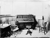 The Music Room, Miss A.M. Harmon's Home and Day School, (N.E. corner of Elgin and MacLaren Streets) Jan. 1894