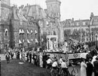Pageant passing through grounds in front of East Block during Jubilee Celebrations on Parliament Hill July 1927