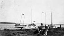 Cape Dalhousie, N.W.T., c. 1930. the boats from left to right are the "Blue Fox", probably the "Etighiak", the "Okevik", and the "Nanuk" [ca. 1930]
