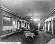 Government House, Toronto, the upper hall - view of east end with staircase at west end leading to second floor 1912