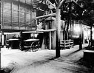 Salt carts over intake of Rotary Driers, Dominion Salt Co., Sarnia, Ont 1923 - 1924