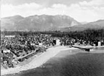 Air view of English Bay showing Englesea Lodge and Sylvia Court ca. 1900-1925