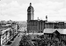 Bekins Building and Pender St ca. 1900-1925