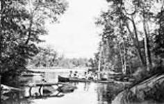 Canoeing on Shadow River, Muskoka Lakes ca. 1900-1925
