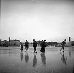 Minto group skating on Ottawa River, December, 1901 1901