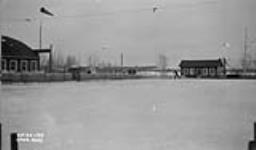 (Relief Projects - NO. 20). The camp hockey rink Feb. 1935