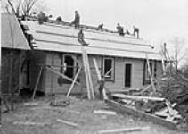 (Relief Projects - No. 27). Hut under construction May 1933