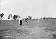(Relief Projects - No. 30). Relief personnel playing cricket May 1933