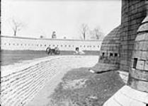 (Relief Projects - No. 37). Rebuilt dry stone wall and moat of Fort Frederick, RMC May 1936