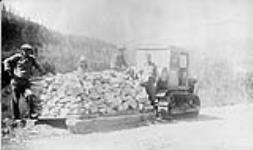 (Relief Projects - No. 61). Hauling rock to fill at Crowsnest east July 1933