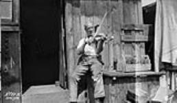(Relief Projects - No. 57). Camp made violin and its maker Sept. 1934