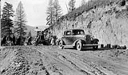 (Relief Projects - No. 64). Gas shovel widening the existing road Oct. 1933
