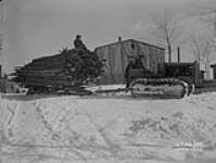 (Relief Projects - No. 103). Tractor pulling logs Apr. 1934