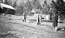 (Relief Projects - No. 131). Col. Russell, Major Chambers and Mr. Kinghorn at Camp 422 Feb. 1934
