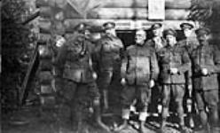 Canadian gunners of the 68th Battery, R.C.A.; outside Y.M.C.A. hut, Mala Beresnik, Northern Russia, c.May 1919 C.MAY, 1919