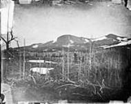 North east peaks of Ilgachuz Mountain looking across the 5270' terrace, B.C 1846