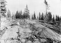 Glaciated basalt at camp on Porcupine Ridge, 5930'. Kamloops District, B.C Aug. 26, 1890