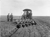 Breaking two miles east of Asquith, Sask., on Andy Mather's farm by Conboy Bros 1910