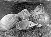 Pomo seed gathering utensils; burden baskets and seed-beater. [California] 1924