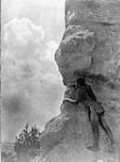 A Sentinel at San Ildefonso, [a Tewa Village lying in the Valley of the Rio Grande in north New Mexico]. In prehistoric times the Tewa were beset by rouing enemies that many became cliff-dwellers, for the purpose of defense 1926