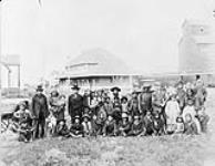 A group of students and parents from the Saddle Lake Reserve (Alberta), en route to the Methodist-operated Red Deer Indian Industrial School, Alberta, date unknown n.d.