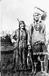 Native man and woman who took part in the 250th Anniversary Celebrations of the H.B. Co., at Edmonton, Alberta 1920