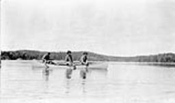 [First Nations men in a canoe fishing in Copper Lake near Flin Flon Lake, Manitoba] n.d.