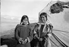 Inuit women, Pond Inlet, N.W.T. [Ukpigjjujaq (left) and Aana Ataguttiaq (right) wearing traditional "Amauti".] 1923