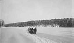Hauling in supplies to G.T.P. Railway construction camp over northern portion of Lake Abitibi to La Reine Station, Que