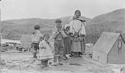 Eskimo woman and children, Port Burwell, [N.W.T.] 1910
