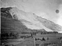 Slide at Frank, [Alta.] from Bellevue 1903, taken 1910
