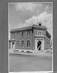 Public Building [under construction], Wilkie, Sask Aug., 1930