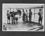 [D.H. 60 'Moth' aircraft visiting the Wigwasati Boys' Camp, Lake Timigami, Ont., Taken 1925-1935.]