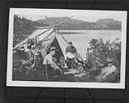 Eldorado Camp, Bonanza No. 5, Silver Lake, N.W.T. L. to R. Richard Dawson, John Drybrough, William Jewett, Spud Arsenault holding large piece of silver 40, William Walton Aug. 1932