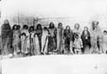 [Members of the Kainai First Nation at Fort Whoop-up]. Original title: Blood Indians at Fort Whoop-up [graphic material] 1881