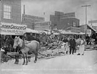 Nine thousand pound of moose and cariboo, killed by Barthoff Bros., being delivered to Dawson 10 February 1900