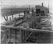 [Toronto, Ont.] East concrete abutment, Eastern Ave. Bridge during construction 1899