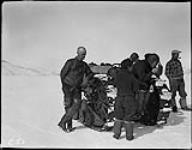 (Hudson Strait Expedition). Personnel with Cletrac tractor 1928