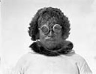 Innu wearing sun goggles 1928.