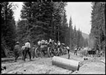 Men going to work and moving to another camp - Miles 35 and 53. Big Bend Columbia Highway, Sept. 1931 Sept. 1931
