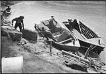 Loading York boats at Boulder Creek Landing, Big Bend columbia Highway, September 1932 Sept. 1932