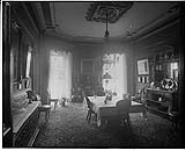 Residence of Sir Wm. Mortimer Clark, 303 Wellington Street West, Toronto, Ontario. View of the dining-room, looking south [1912]