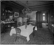 Residence of Sir Wm. Mortimer Clark, 303 Wellington Street West, Toronto, Ont. View of the dining-room, looking north [1912]