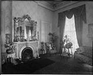Residence of Sir Wm. Mortimer Clark, 303 Wellington Street West, Toronto, Ontario. East end of Drawing room, windows looking south [1912]