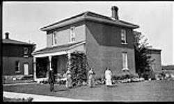 [Family outside house in Renfrew, Ont.] [graphic material] 1913