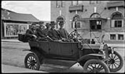 Automobile on Raglan Street - showing Hotel Renfrew in background ca. 1910