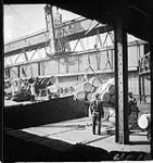 [Unloading cargo, Montreal, P.Q., 1933.] 1933