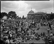 Crowd of children at playground, [Canadian National Exhibition, Toronto, Ont.] Aug. 31, 1938