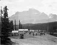 Warden's cabin at junction of Howse and Saskatchewan rivers. Mount Murchison in background Aug. 1934