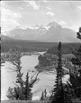 Bridge over N. [North] Saskatchewan River looking up Mistaya Valley, Banff-Jasper Highway 1940.